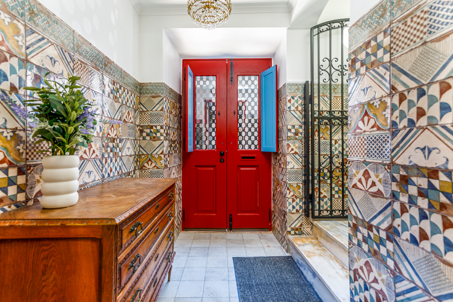After: bright, inviting villa entrance with perfectly balanced interior lighting